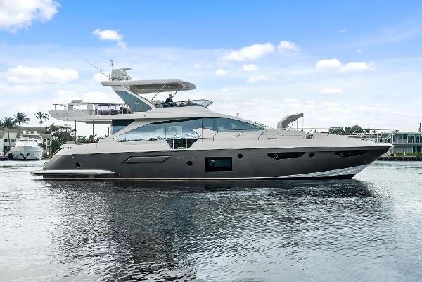 Azimut 72 FLY 2017 Azimut 72 Flybridge yacht on calm water, showcasing sleek design and luxury features.