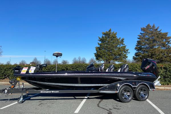 Ranger Z521R Ranger Cup Equipped 2024 Ranger Z521R Ranger Cup Equipped boat on trailer in parking lot.