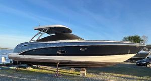Formula 350 Crossover Bowrider 2015 Formula 350 Crossover Bowrider boat on display, side view, outdoors.