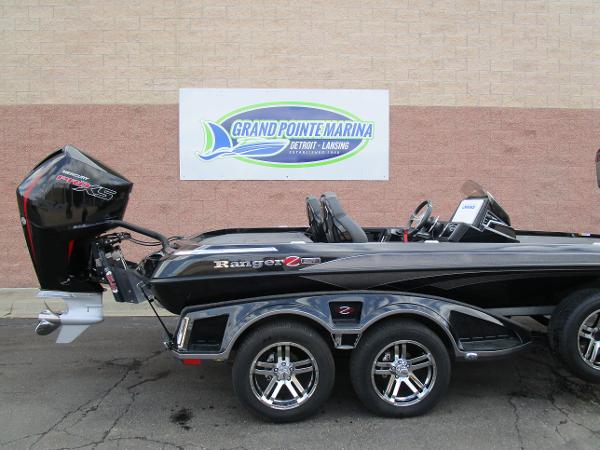 Ranger Z521 Ranger Cup 2024 Ranger Z521 Ranger Cup boat at Grand Pointe Marina, featuring sleek design and powerful engine.