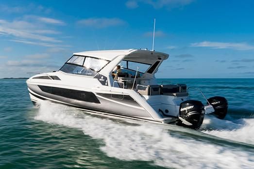 Aquila 36 Sport Aquila 36 Sport 2019 cruising on open water with twin Mercury engines.