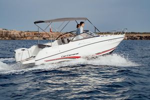 Jeanneau Cap Camarat 6.5 BR 2019 Jeanneau Cap Camarat 6.5 BR boat cruising on open water, side view.