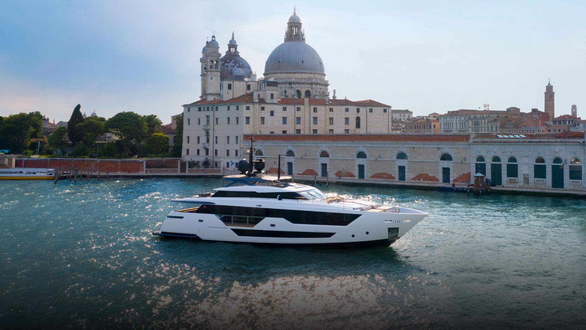 Custom Line 106 Luxury yacht Custom Line 106, 2024 model, cruising near historic architecture.