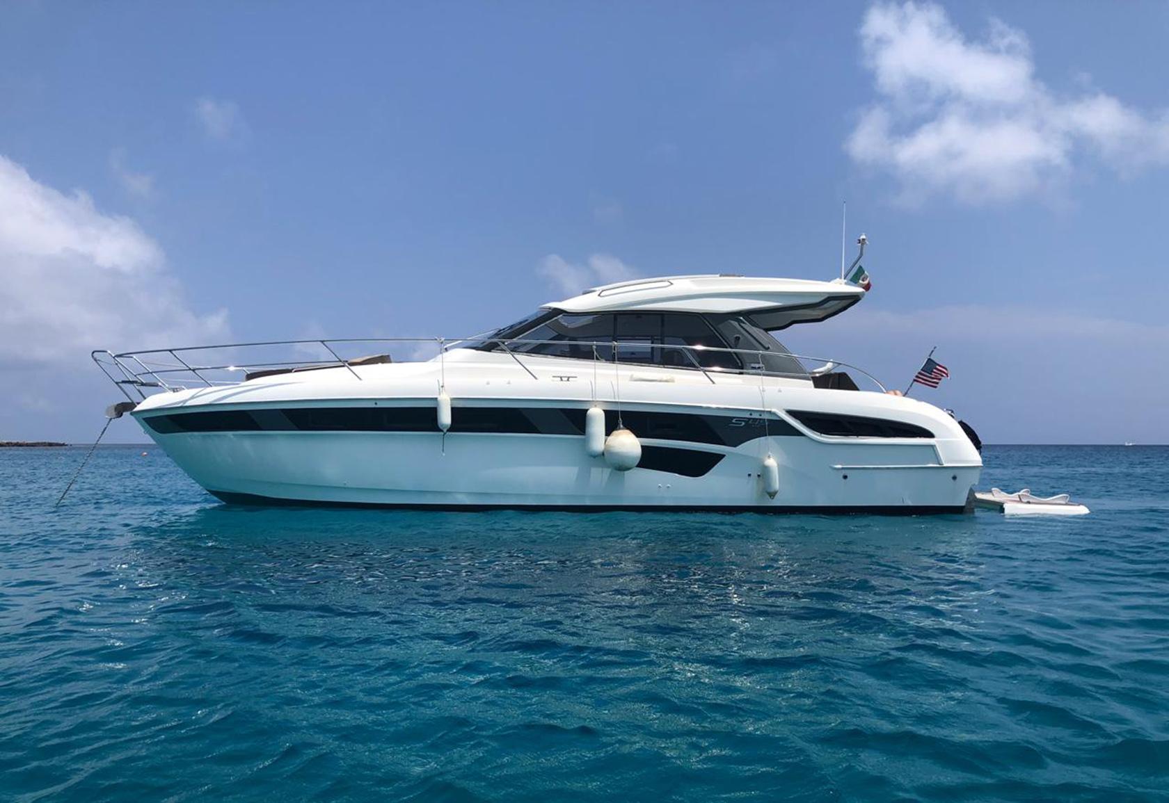 Bavaria S45 HT 2018 Bavaria S45 HT yacht on clear blue water under a sunny sky.