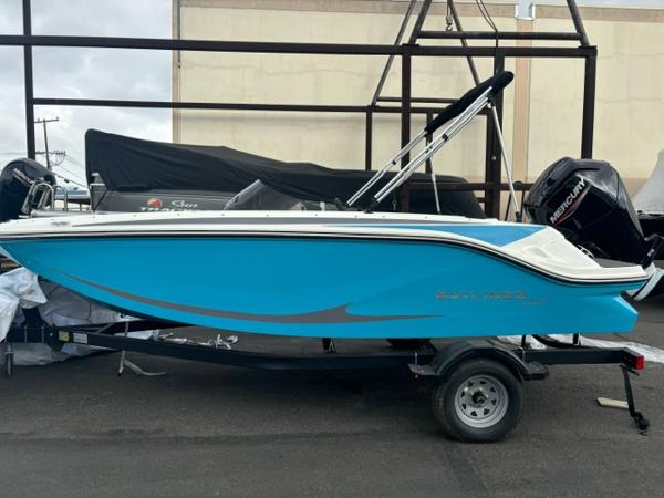 Bayliner Element M17 2025 Bayliner Element M17 boat in vibrant blue on trailer.