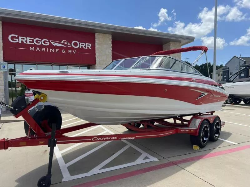 Crownline Boats 220 SS 2024 Crownline 220 SS boat on trailer at Gregg Orr Marine & RV dealership.