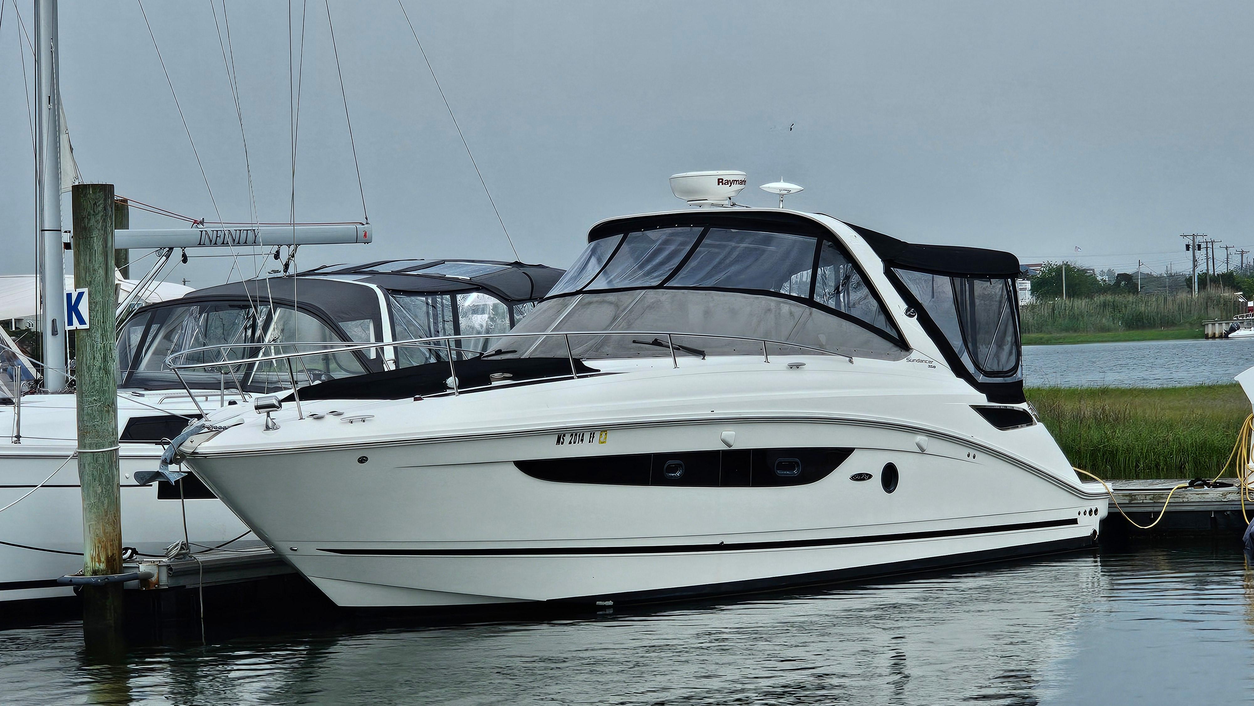 Sea Ray 350 Sundancer 2014 Sea Ray 350 Sundancer yacht docked at marina.