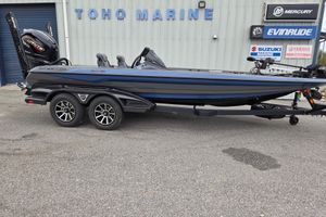 Skeeter FXR21 Apex 2026 Skeeter FXR21 Apex boat on trailer at marine dealership.