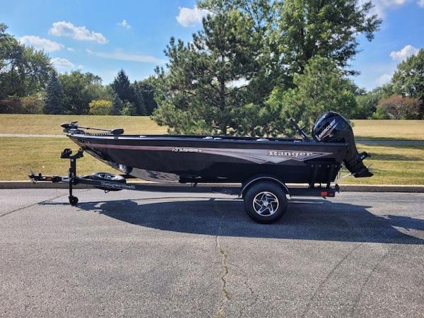 Ranger VS1665T 2024 Ranger VS1665T boat on trailer, parked outdoors on a sunny day.