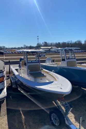 Sportsman Masters 247OE Bay Boat 2025 Sportsman Masters 247OE Bay Boat on trailer under clear blue sky.