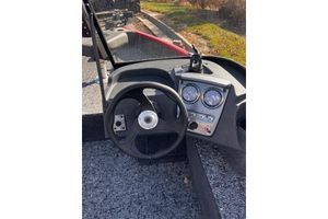 Tracker Pro Guide V-16 WT Steering console of 2026 Tracker Pro Guide V-16 WT boat with gauges and controls.
