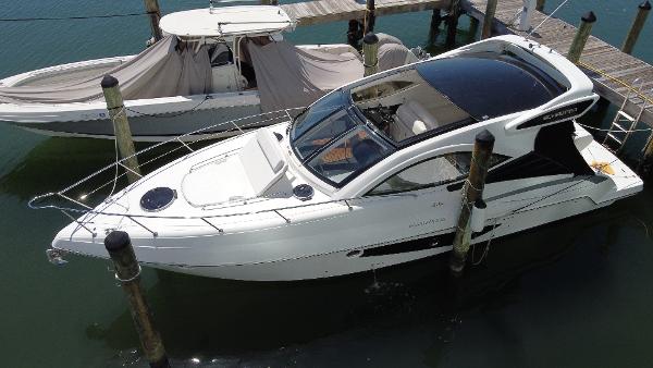 Schaefer 375 HT 2023 Schaefer 375 HT yacht docked at marina, aerial view.