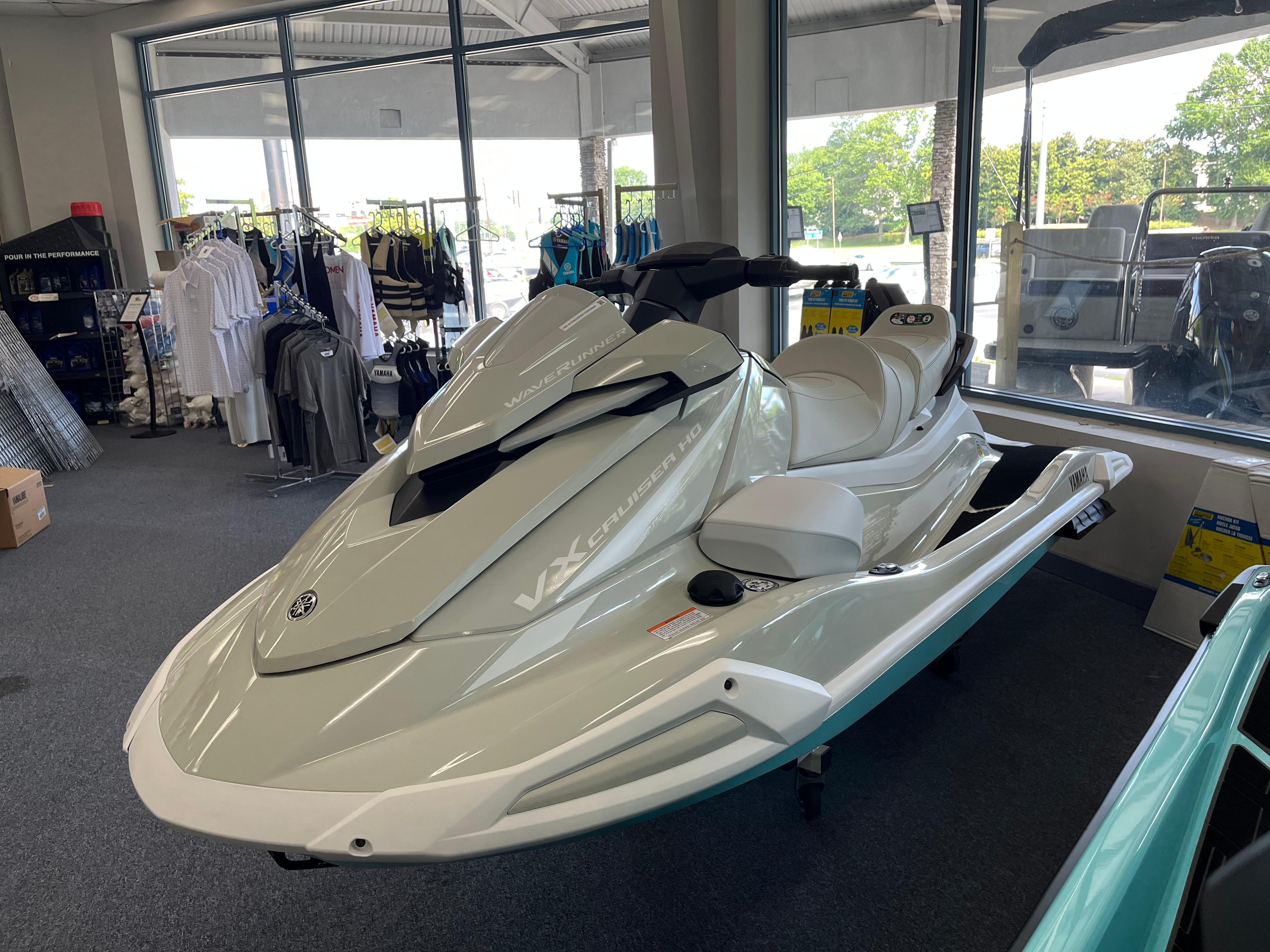 Yamaha WaveRunner VX Cruise ho 2025 Yamaha WaveRunner VX Cruise HO displayed in showroom with apparel in background.