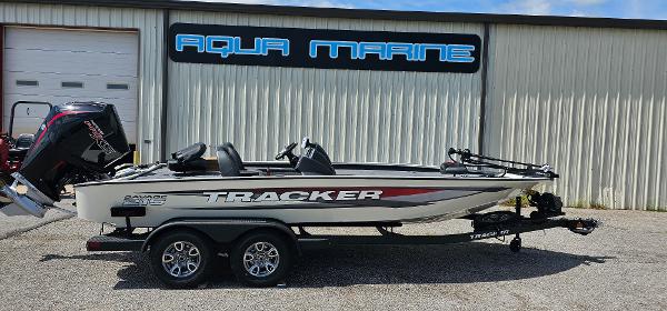 Tracker Savage 215 2025 Tracker Savage 215 boat on trailer outside Aqua Marine building.