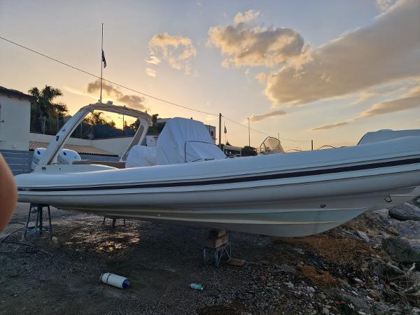 Almar 911S 2023 Almar 911S boat at sunset, docked on land.