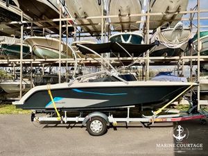 Sealver Wave Boat 656 2022 Sealver Wave Boat 656 on trailer, parked in marina storage area.