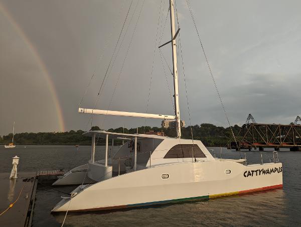 Kelsall 38ma Kelsall 38ma catamaran docked, rainbow in background, 2019 model.