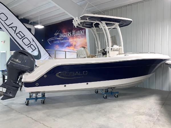 Robalo R222 Explorer 2024 Robalo R222 Explorer boat displayed indoors at Anglers Marine dealership.