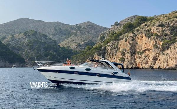 Bavaria 35 Sport Bavaria 35 Sport yacht cruising near rocky coastline, 2006 model.
