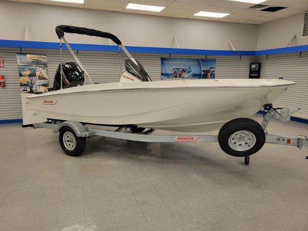 Boston Whaler 160 Super Sport 2025 Boston Whaler 160 Super Sport boat displayed indoors on a trailer.