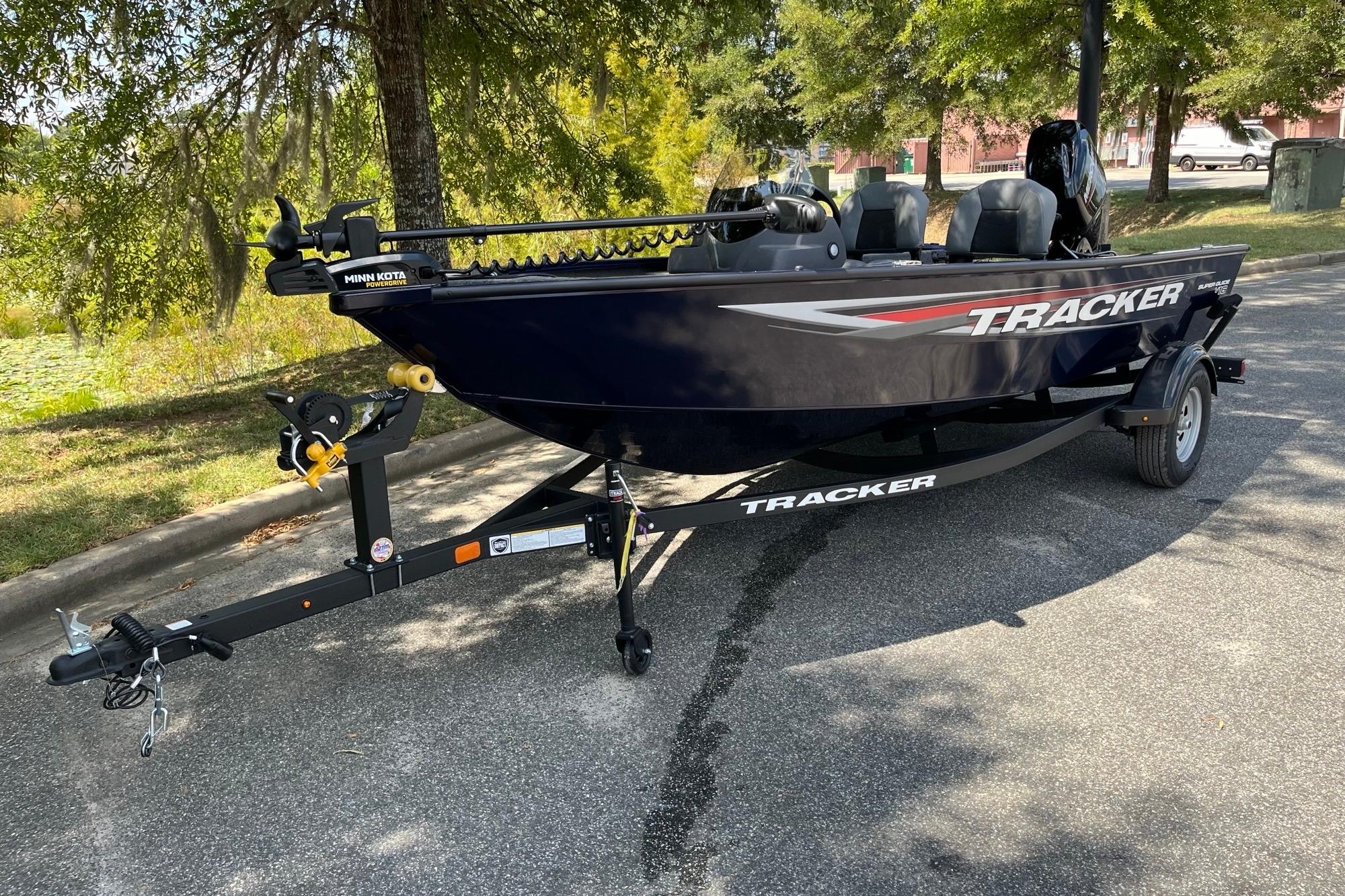 Tracker Super Guide V-16 SC 2026 Tracker Super Guide V-16 SC boat on trailer, parked outdoors.