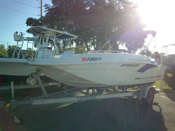 Starcraft SVX 171 2022 Starcraft SVX 171 boat on trailer in sunny outdoor setting.