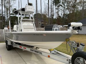 Avenger 26 Bay 2019 Avenger 26 Bay boat on trailer in residential driveway.