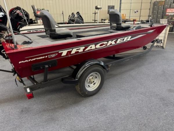 Tracker Panfish 17 2025 Tracker Panfish 17 boat, red with dual seats, displayed indoors.