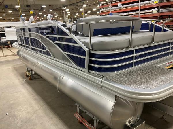 Bennington 21LSB 2023 Bennington 21LSB pontoon boat in a factory setting, showcasing sleek design and craftsmanship.