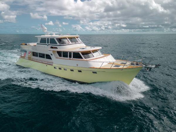 Marlow 72E LRC 2006 Marlow 72E LRC yacht cruising on open sea under cloudy sky.