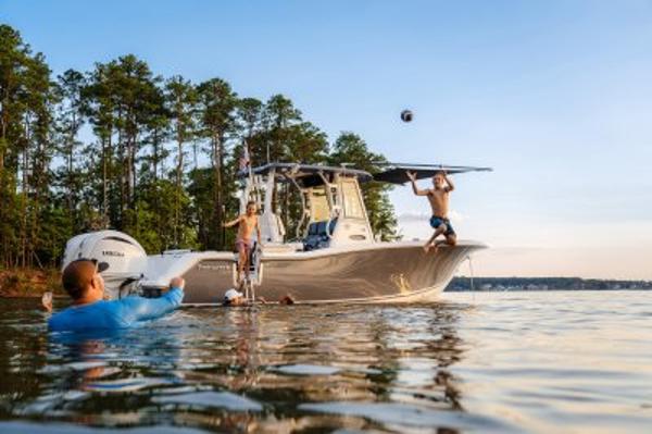 Tidewater 282 CC Adventure 2026 Tidewater 282 CC Adventure boat with people enjoying water activities.