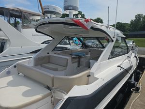 Regal 42 Sport Coupe 2011 Regal 42 Sport Coupe yacht docked, featuring spacious seating and modern design.