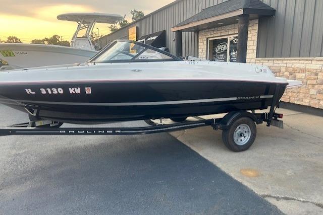 Bayliner 175 Bowrider 2016 Bayliner 175 Bowrider boat on trailer, parked outside a building.