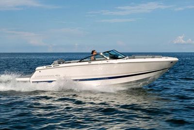 Chaparral SSX 4 2026 Chaparral SSX 4 speedboat cruising on open water under clear skies. Boat