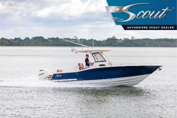 Scout 277 LXF 2025 Scout 277 LXF boat cruising on water, authorized dealer logo visible.