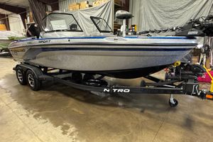Nitro ZV19 Sport Pro 2026 Nitro ZV19 Sport Pro boat on trailer in a warehouse setting.