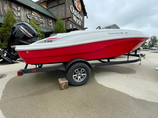 Tahoe T18 2025 Tahoe T18 boat in red and white on a trailer at Outdoor World.