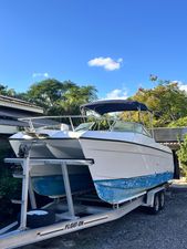 Glacier Bay Catamaran 2002 Glacier Bay Catamaran on trailer under clear blue sky.