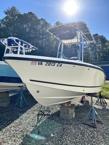 Mako 184 CC 2016 Mako 184 CC boat on stands under bright sunlight.