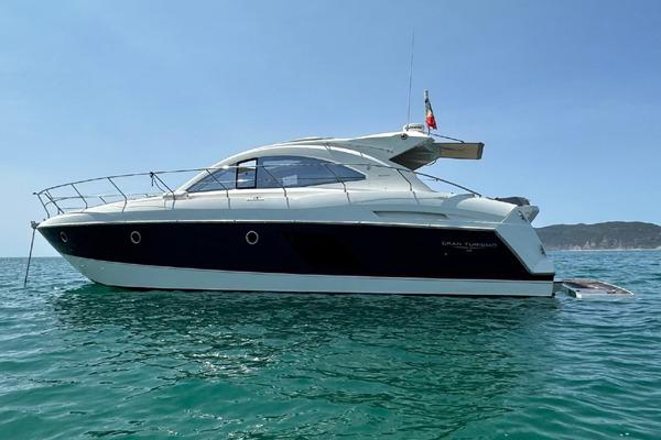 Beneteau 49 GT 2012 Beneteau 49 GT yacht on calm sea, side view.