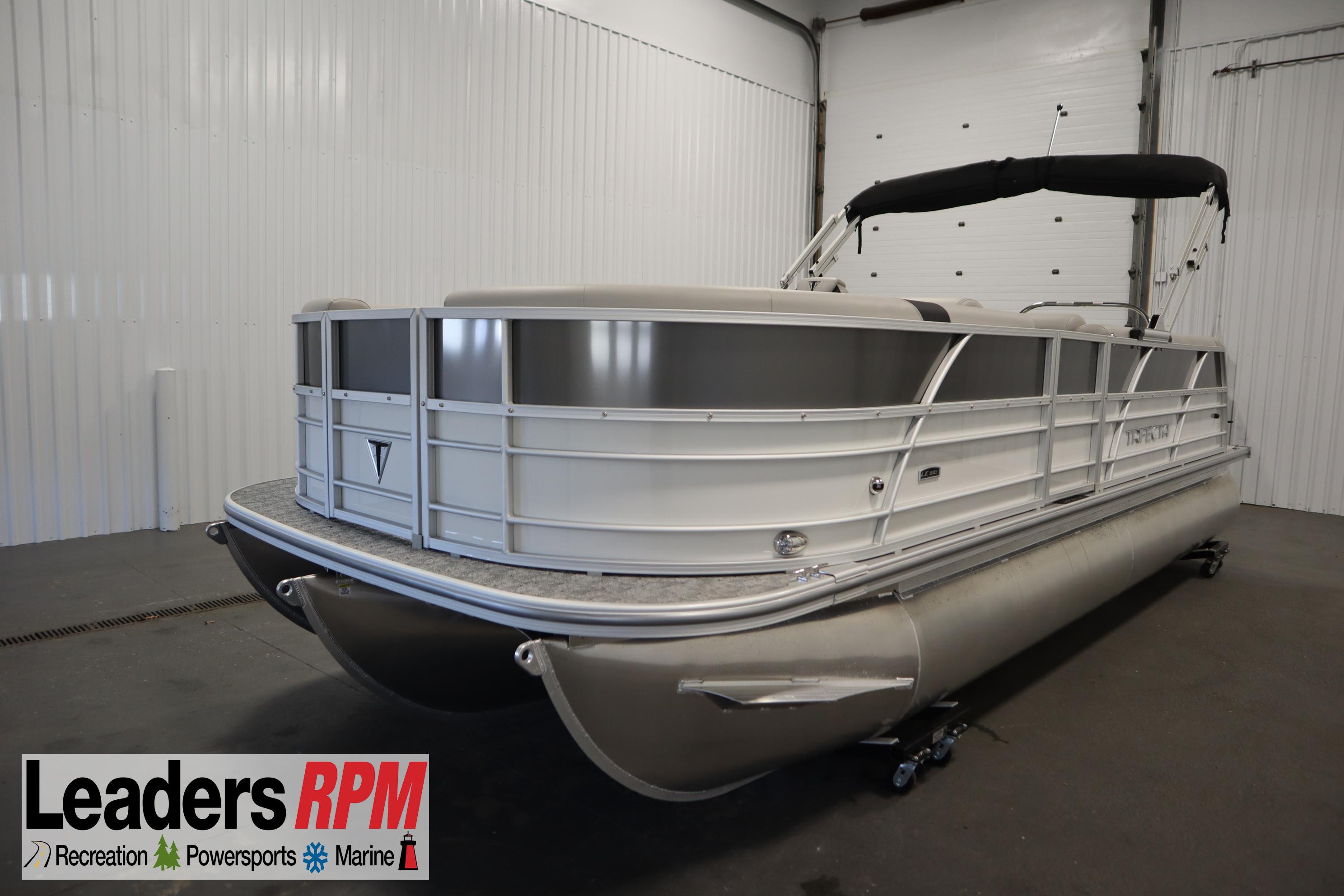 Trifecta 22C2 LE 2.75 2025 Trifecta 22C2 LE 2.75 pontoon boat in indoor showroom setting.