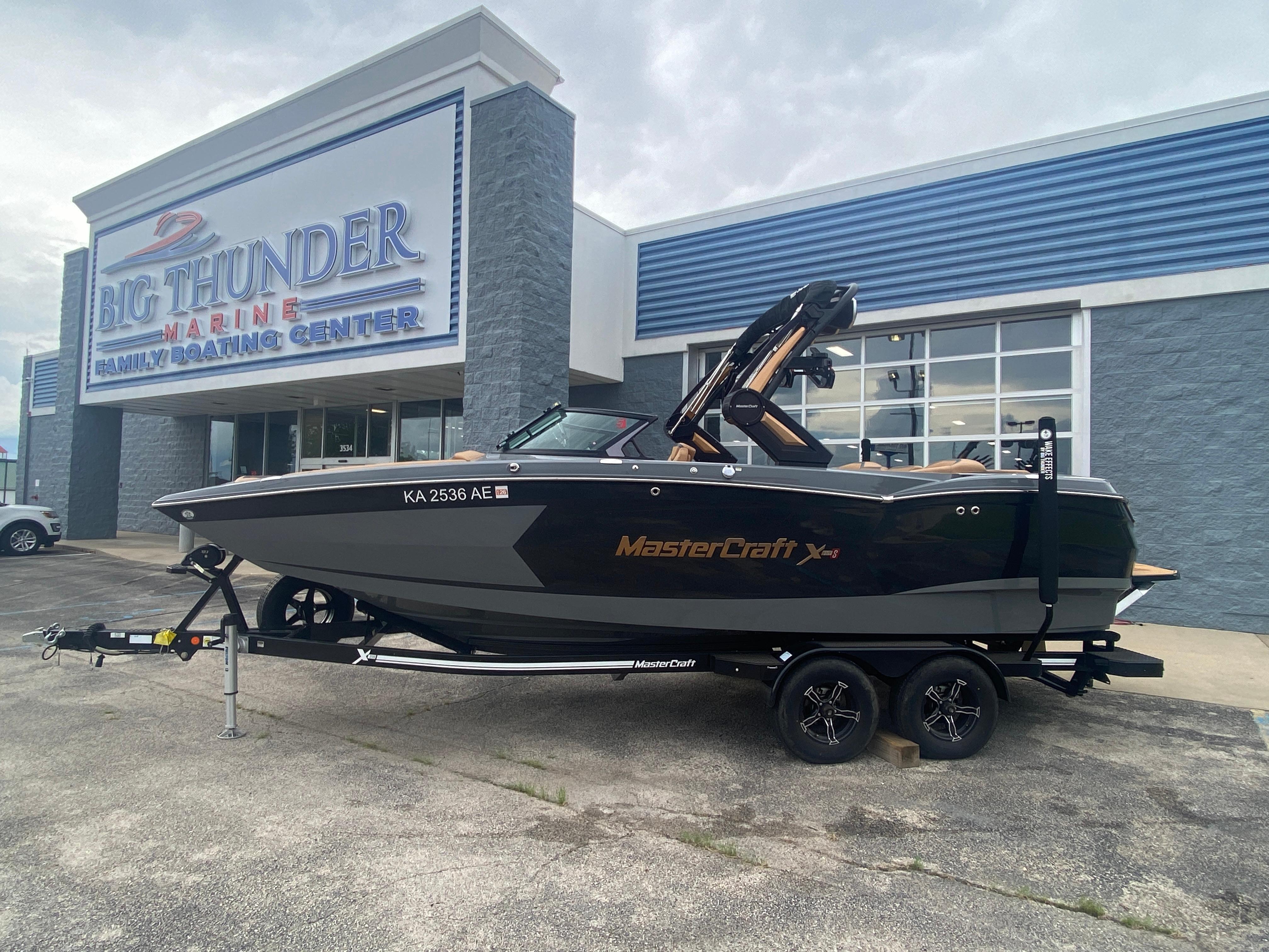 MasterCraft XStar 2022 MasterCraft XStar boat at Big Thunder Marine dealership, parked on a trailer.