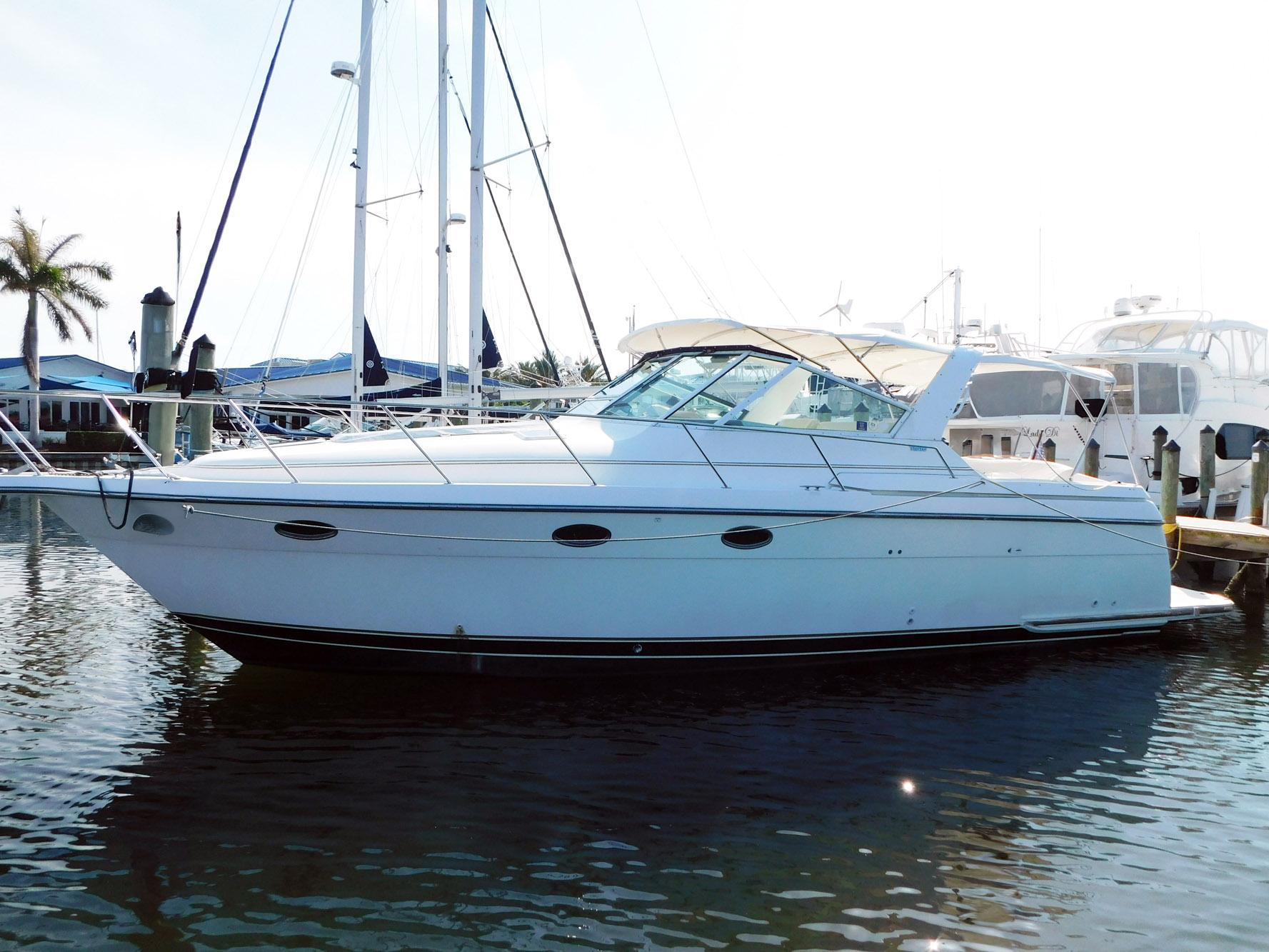 Tiara Yachts 3500 Express 2001 Tiara Yachts 3500 Express docked in marina, side view.