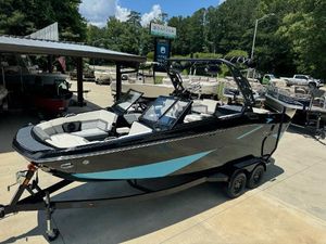 Heyday H-22 2023 Heyday H-22 boat on trailer at dealership, ready for sale.