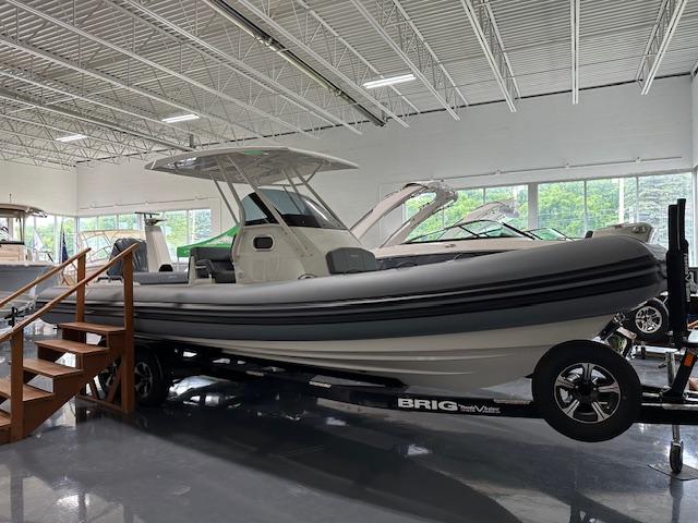 Brig Eagle 8 2025 Brig Eagle 8 boat displayed indoors on a trailer.