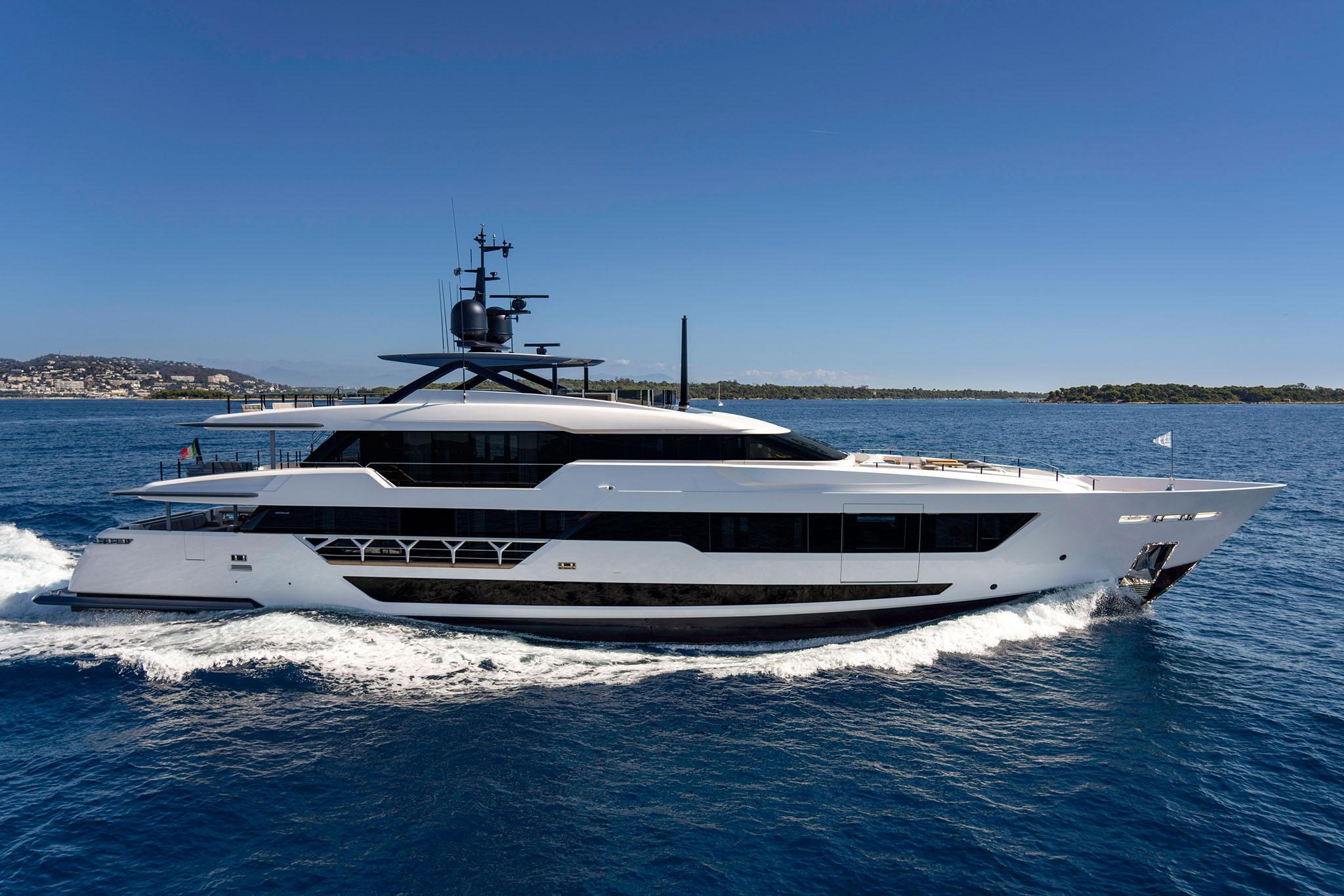 Custom Line 140' 2024 Custom Line 140 yacht cruising between towering cliffs.