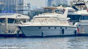 Gulf Craft Ambassador 55 1996 Gulf Craft Ambassador 55 yacht docked at marina, surrounded by other boats.