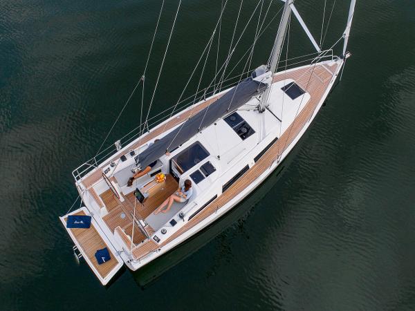Hanse 348 2024 Hanse 348 sailboat on calm water, top view.