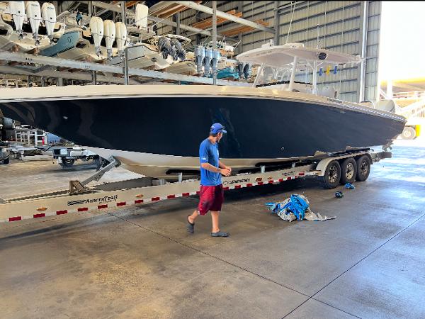 Fountain 38cc 2018 Fountain 38cc boat on trailer in storage facility.