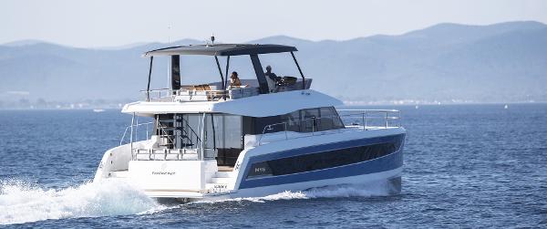 Fountaine Pajot MY 6 2025 Fountaine Pajot MY 6 motor yacht cruising on open water.